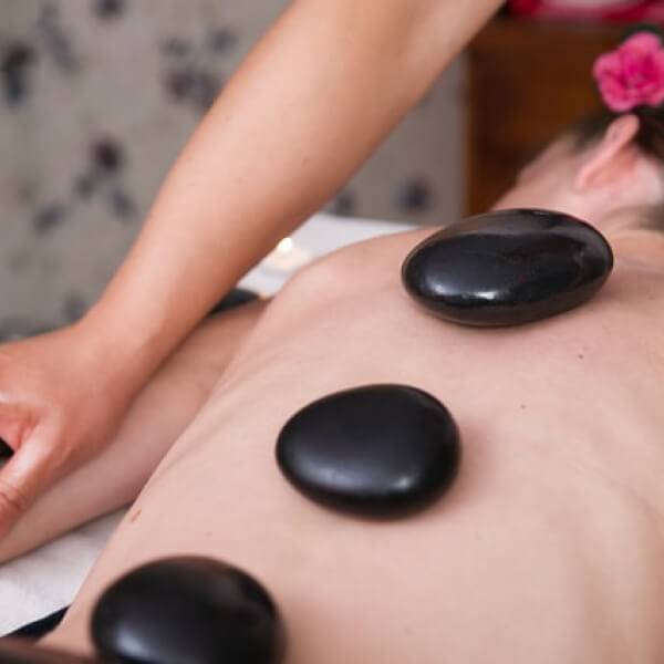 women undergoing stone therapy